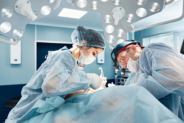 doctors performing surgery