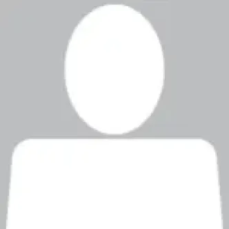 Gray and white silhouette of a person as a placeholder.